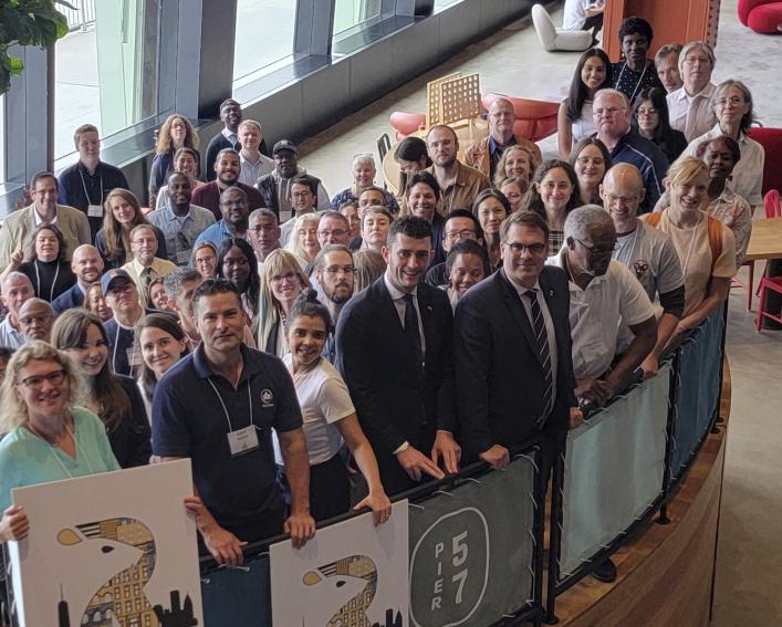 Attendees of the inaugural National Urban Rat Summit gathered for a photo.