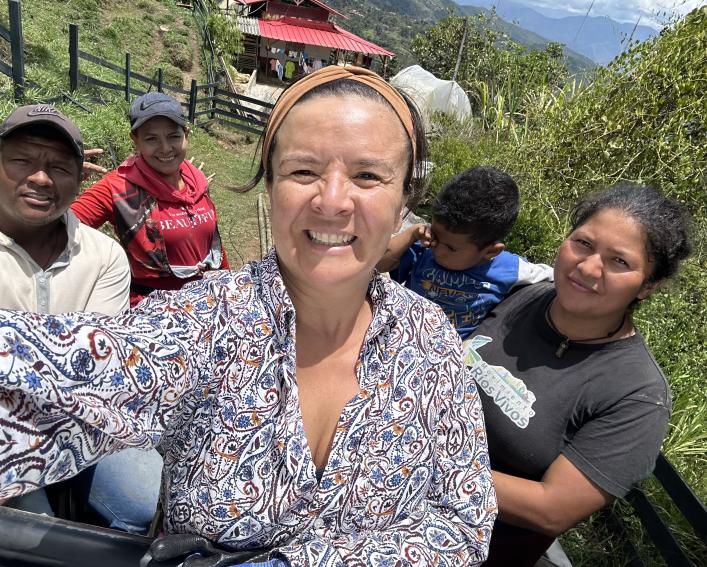 Group takes a selfie in the field