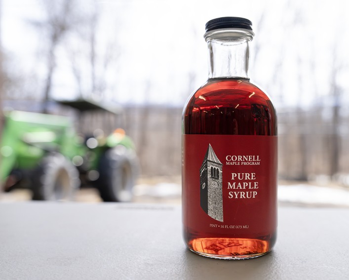 A bottle of syrup by the Cornell Maple Program