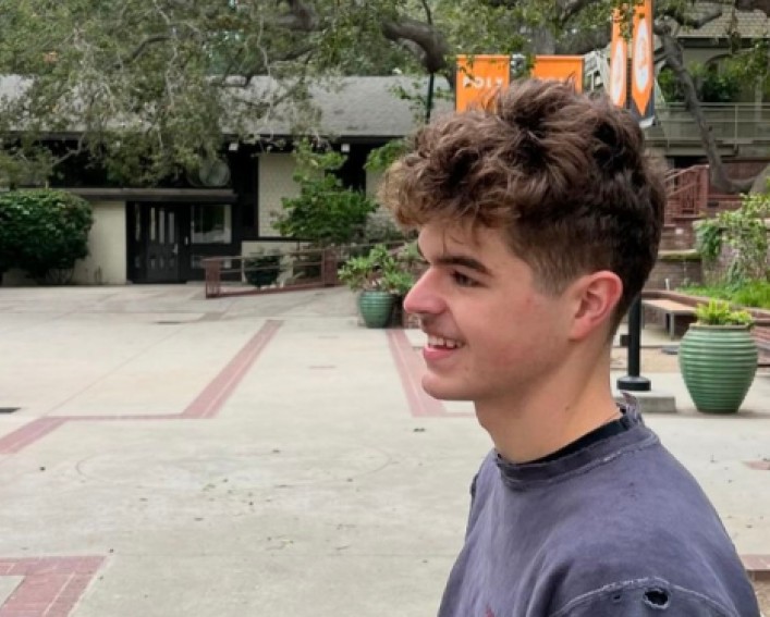 A photo of Santiago McKinn in a garden.