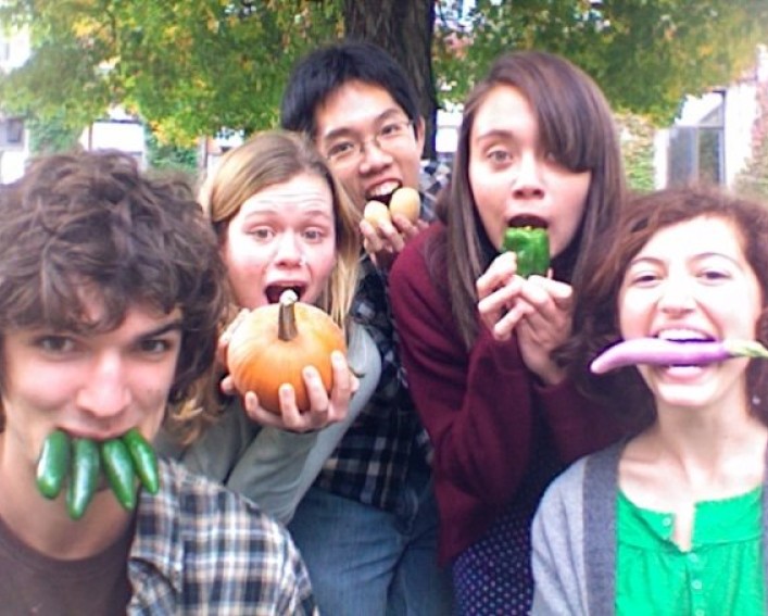 Students posing with produce