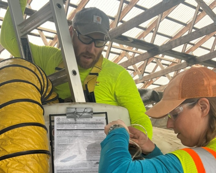two people perform a manure safety test