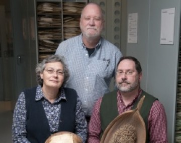 Bailey Hortorium staff showing large specimens from their collection