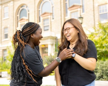 two students laughing