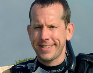 close up of a man wearing scuba gear