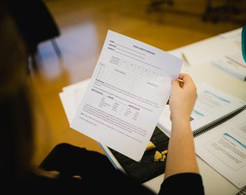 Person reviewing documents