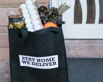a bag with food in front of a door