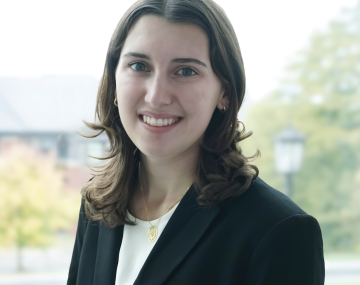 Smiling woman in suit jacket