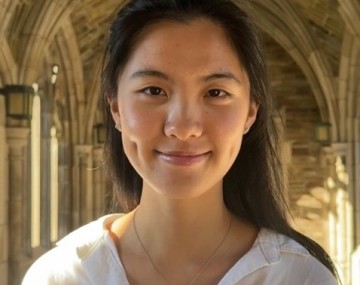 Smiling woman in arches