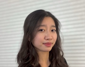 Smiling woman in suit