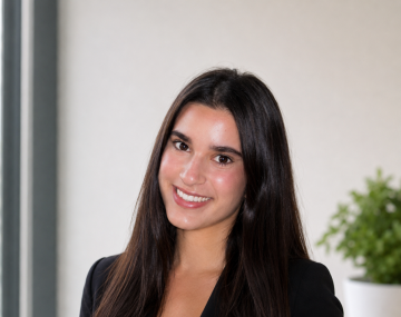 Smiling woman with black suit