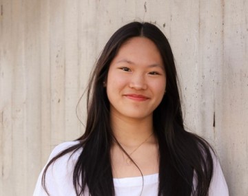 Smiling woman with white top