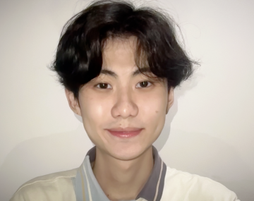 short dark hair white sweater